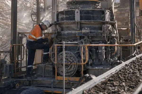 full machine crusher engineering support Technician performing maintenance with full machine crusher engineering support on cone crusher at mining site